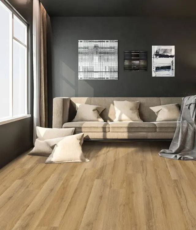 Moody dark living room with amber-toned wood-look flooring.